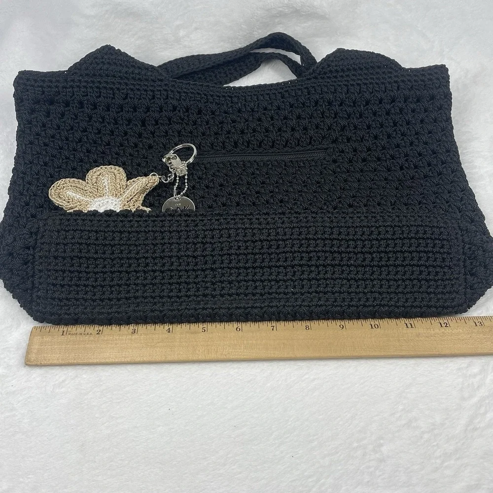 The Sak Black Crochet Shoulder Bag Boho Knit Purse Charm Flower NWOT